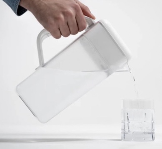 Pouring fresh water from the Spout into a glass