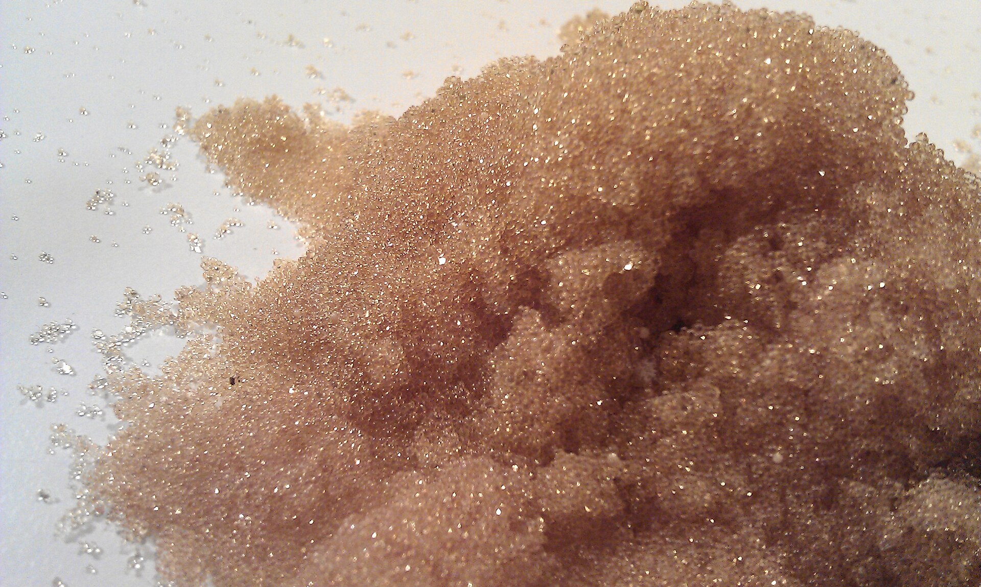 Amber ion exchange resin beads